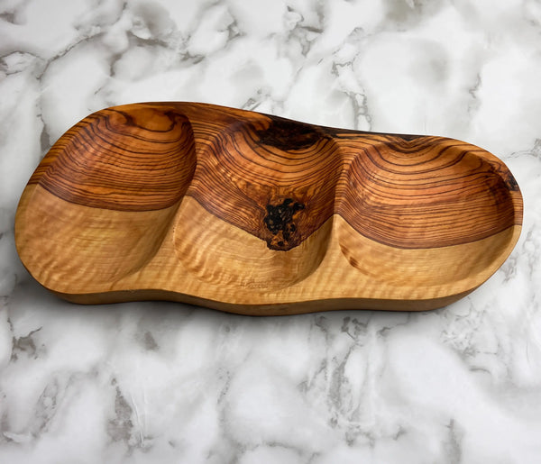 Multi-section olive wood snack bowl, ideal for nuts, olives, dips, and appetizers. Features a rustic design